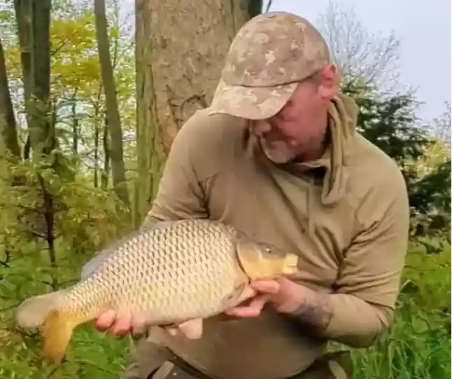 Holding A nice Common Carp For The Camera